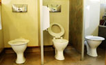 Three child toilets for centre with full height walls.